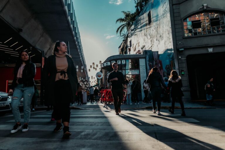Bustling Buenos Aires street scene capturing daily life with pedestrians and urban architecture.